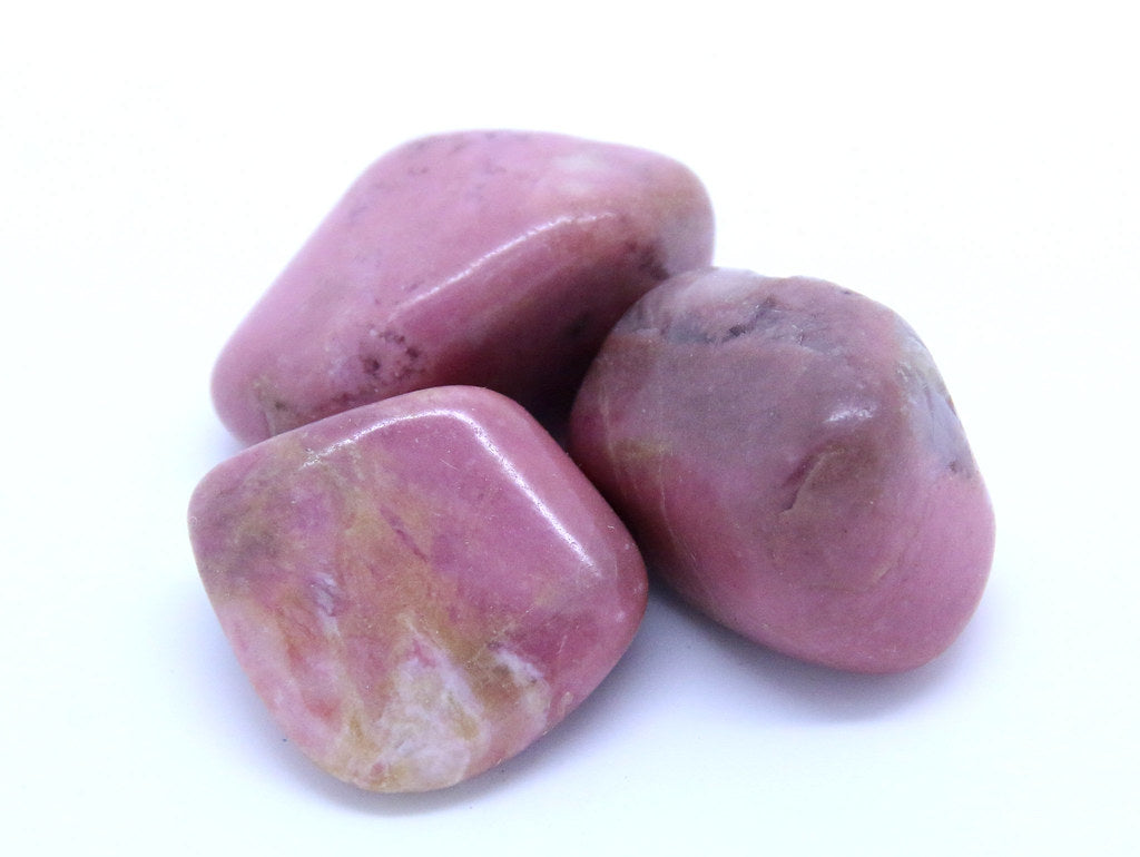 Matt Pink colour. Sometimes with black inclusions caused by black manganese