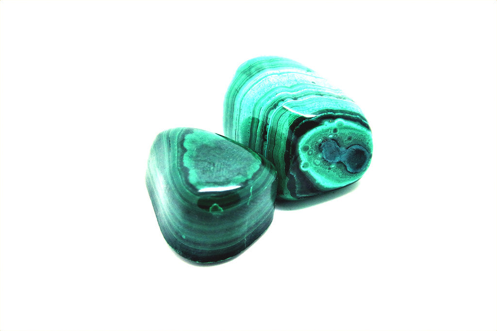 Acoppercarbonatehydroxide mineral with green bands and swirls. A soft and POISONOUS mineral